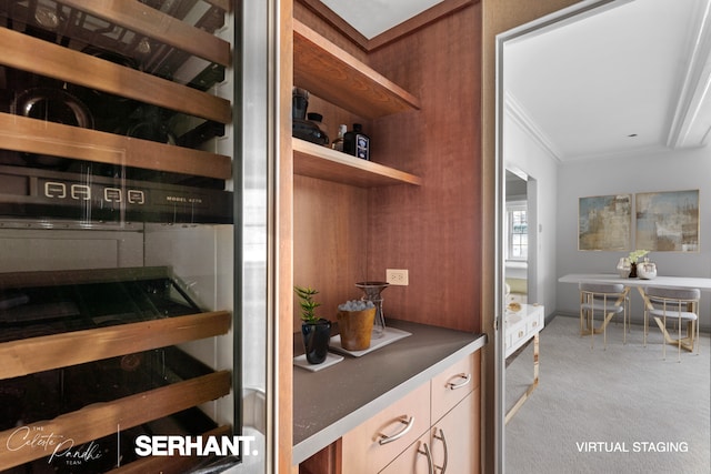 2 E 61st St Unit 1001/1003, New York City, NY 10021 - kitchen with carpet flooring, open shelves, and crown molding