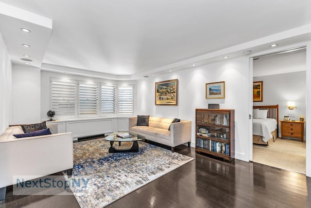 living room featuring wood finished floors and recessed lighting