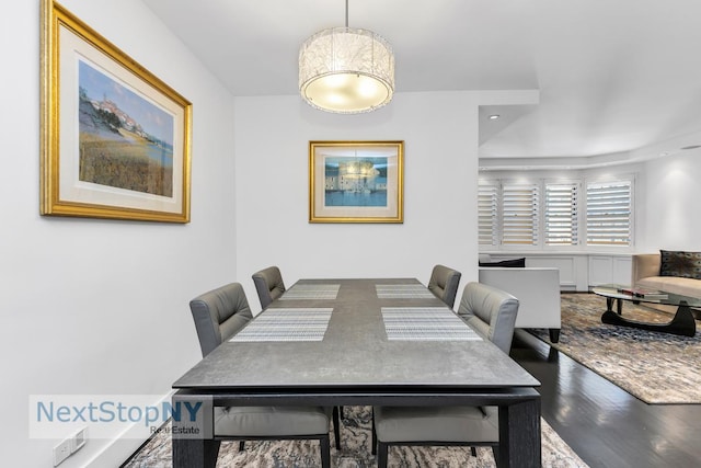 dining area featuring wood finished floors