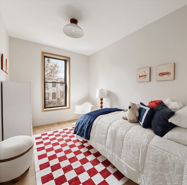 bedroom featuring hardwood / wood-style flooring