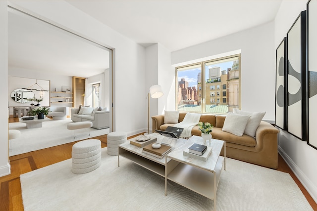 sitting room featuring light colored carpet