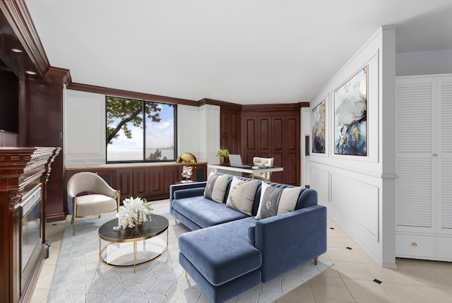 tiled living room featuring ornamental molding