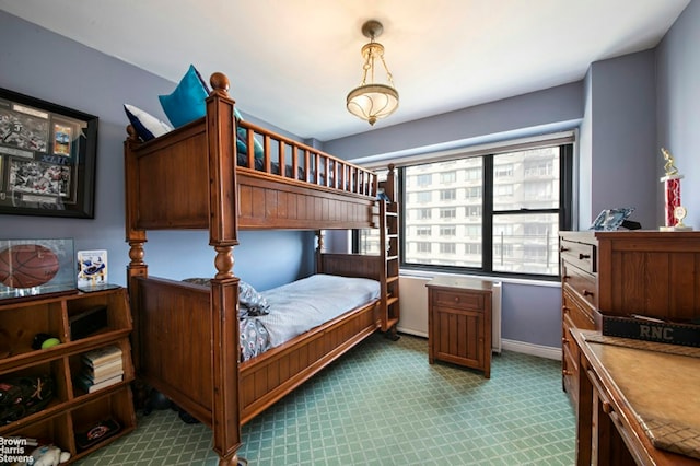 345 E 80th St Unit 19Ef, New York City, NY 10028 - bedroom featuring baseboards