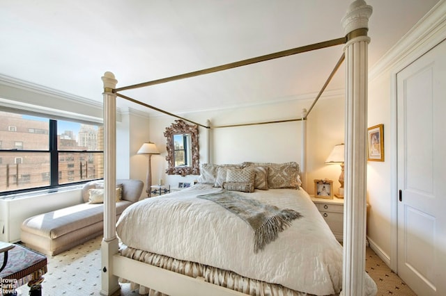 345 E 80th St Unit 19Ef, New York City, NY 10028 - bedroom featuring ornamental molding and multiple windows