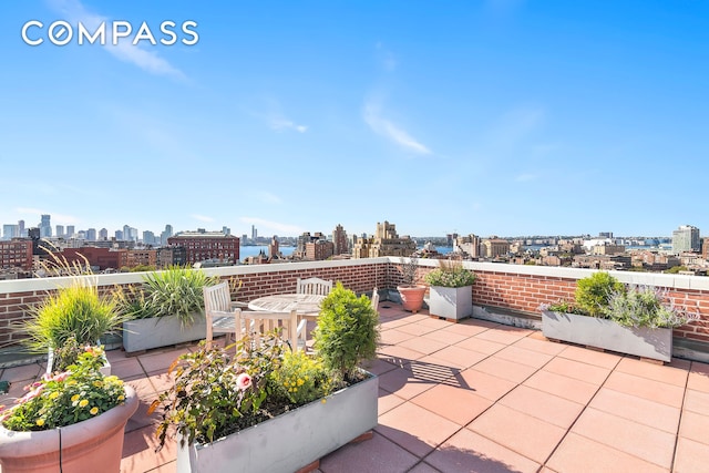 view of patio with a view of city