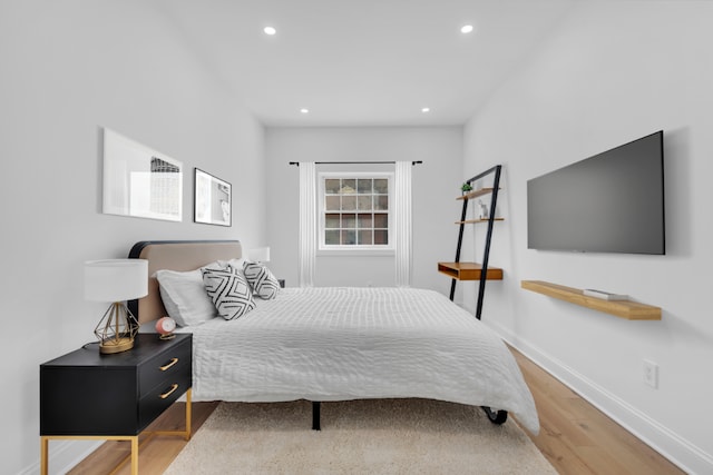 bedroom featuring hardwood / wood-style flooring