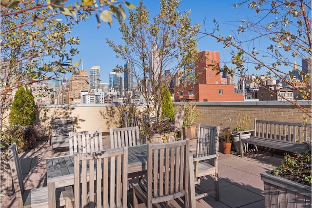 view of patio featuring a view of city