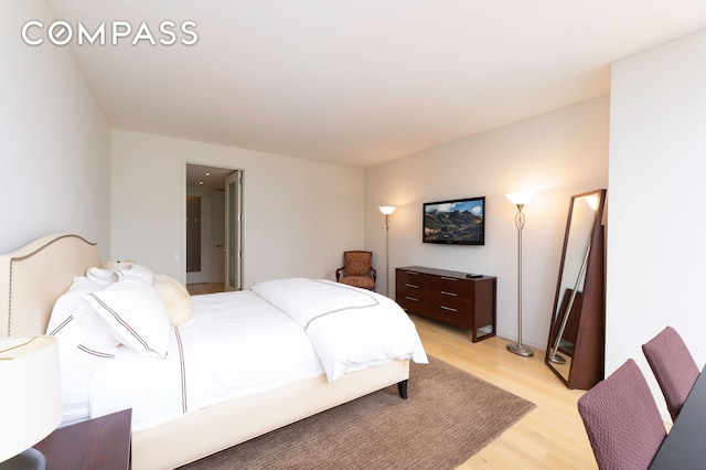 641 5th Ave Unit 49Cde, New York City, NY 10022 - bedroom with light wood finished floors