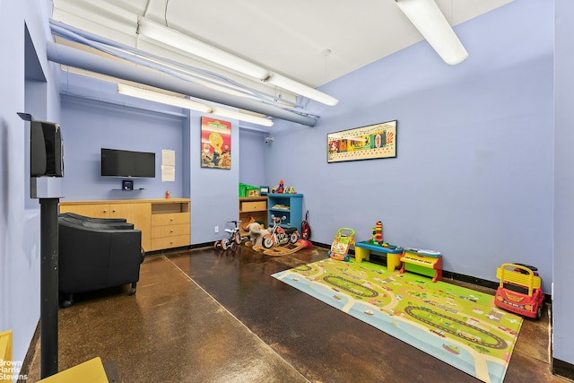 169 E 69th St Unit 2B, New York City, NY 10021 - game room featuring finished concrete flooring