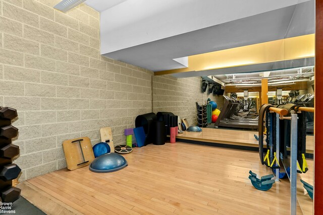169 E 69th St Unit 2B, New York City, NY 10021 - exercise room with hardwood / wood-style flooring