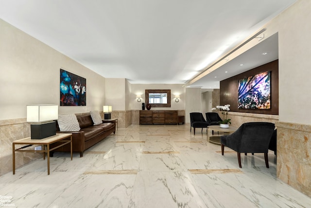 169 E 69th St Unit 2B, New York City, NY 10021 - community lobby with a wainscoted wall and tile walls