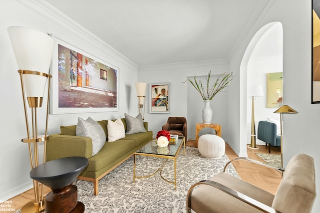169 E 69th St Unit 2B, New York City, NY 10021 - living room with ornamental molding, baseboards, and arched walkways