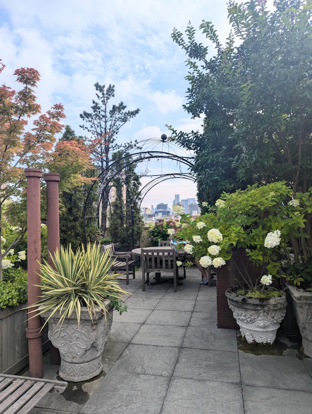 view of patio with a city view