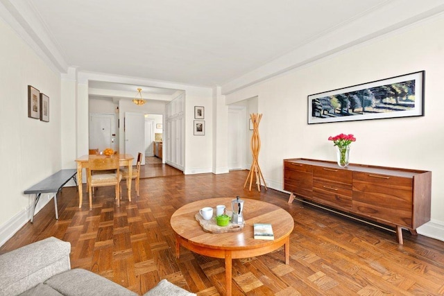 living room with parquet floors and ornamental molding