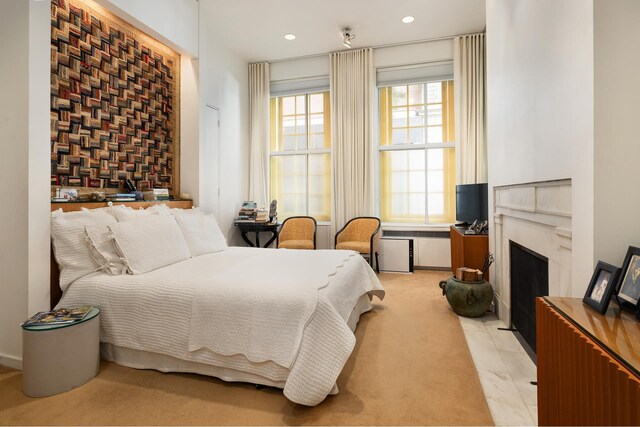 829 Park Ave Unit 1C, New York City, NY 10021 - bedroom featuring a fireplace with flush hearth and recessed lighting