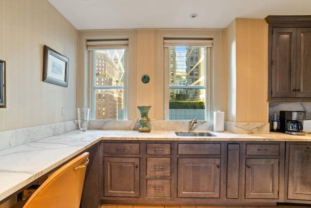 kitchen with sink and stainless steel dishwasher