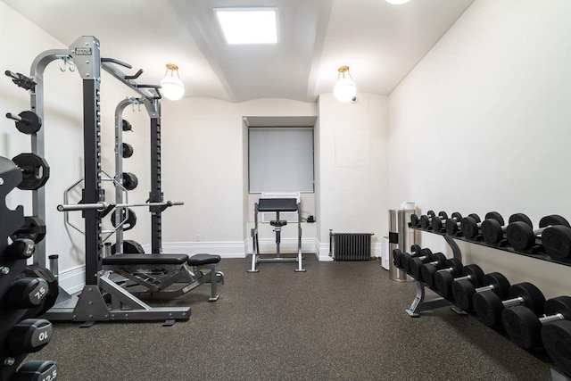 workout area with vaulted ceiling