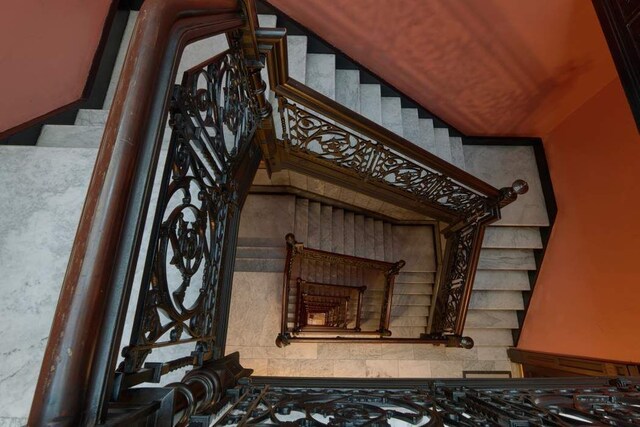 sitting room with hardwood / wood-style floors, ornamental molding, french doors, and a chandelier