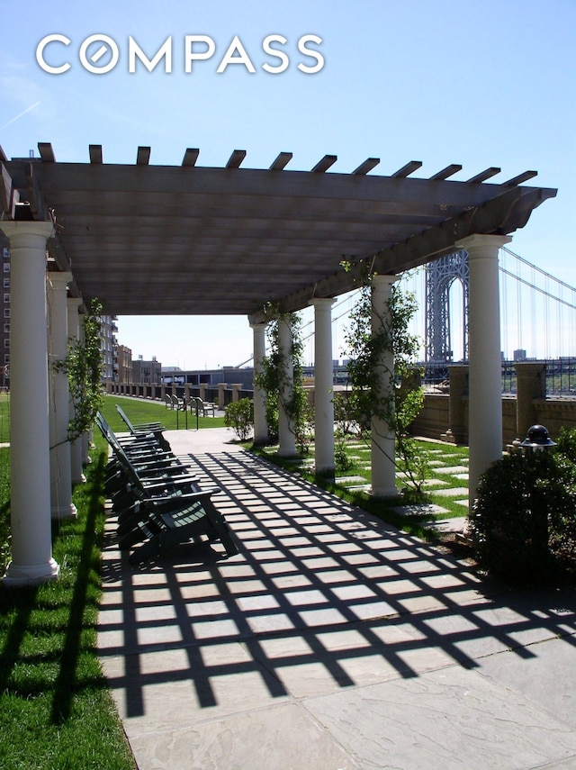 view of home's community with a pergola