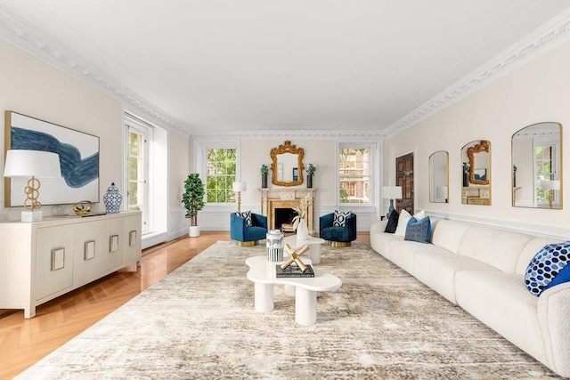 living room featuring crown molding and parquet flooring