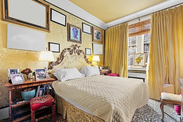 carpeted bedroom featuring crown molding