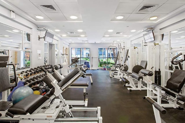 workout area with a drop ceiling