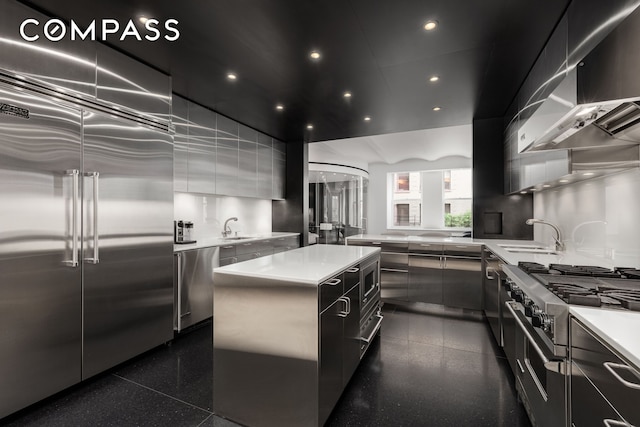 55 Hudson St Unit 3Bcd, New York City, NY 10013 - kitchen with appliances with stainless steel finishes, modern cabinets, a center island, light countertops, and recessed lighting