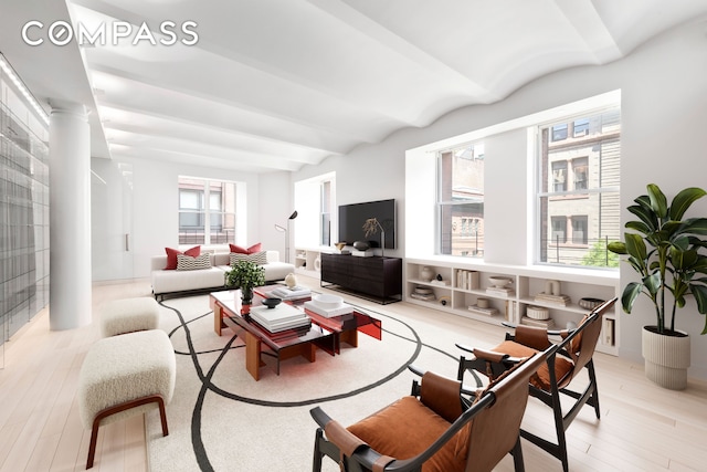 55 Hudson St Unit 3Bcd, New York City, NY 10013 - living area with beam ceiling, light wood-type flooring, and plenty of natural light