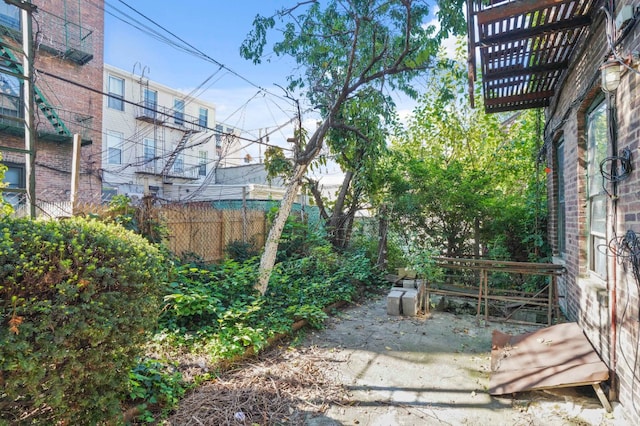 view of yard with fence