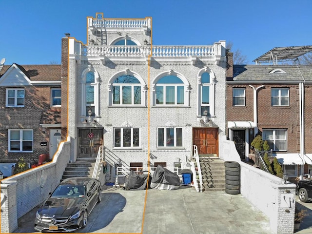 view of property with brick siding