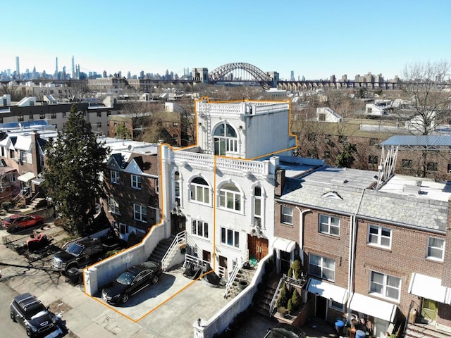 birds eye view of property with a view of city