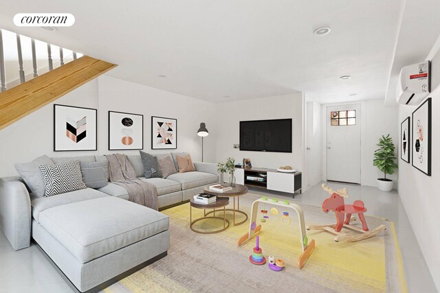 bedroom featuring a wall mounted air conditioner and hardwood / wood-style flooring