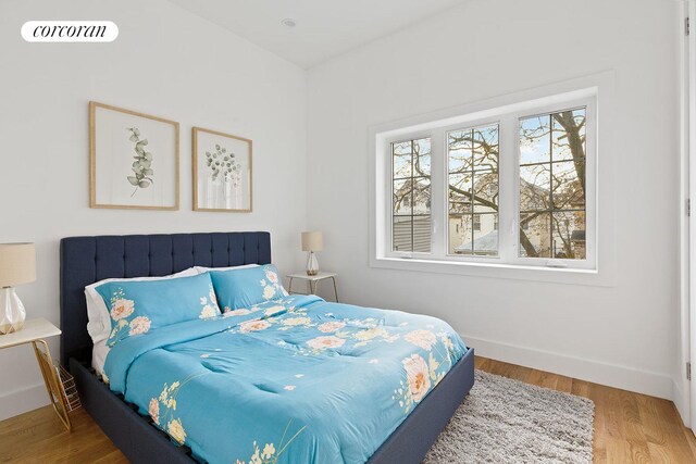 laundry room with an AC wall unit and independent washer and dryer