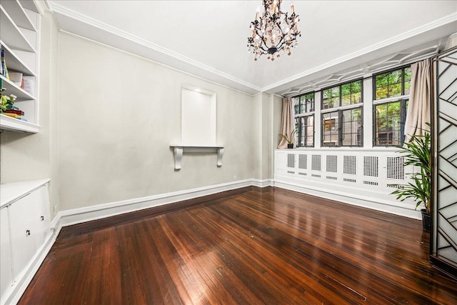 1 W 67th St Unit 2E, New York City, NY 10023 - unfurnished room with a chandelier, baseboards, crown molding, and hardwood / wood-style floors