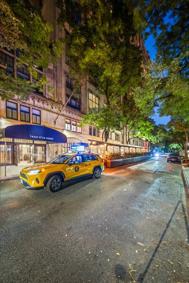 view of road featuring curbs