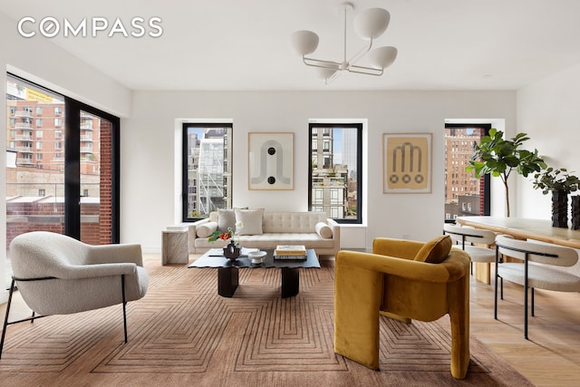 500 W 22nd St Phw, Phw, New York City, NY 10011 - living room featuring a chandelier