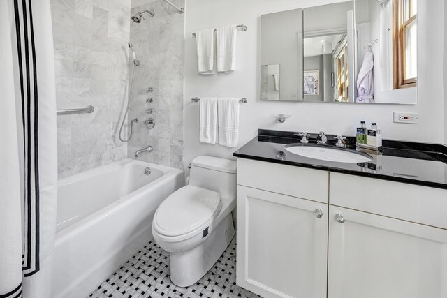 14 E 75th St Unit 7E, New York City, NY 10021 - bathroom featuring toilet, shower / bathtub combination with curtain, and vanity
