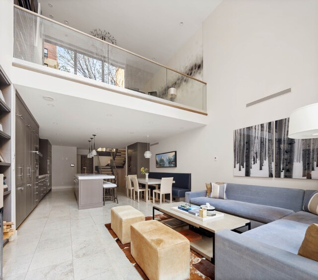 bedroom featuring built in desk and hardwood / wood-style floors