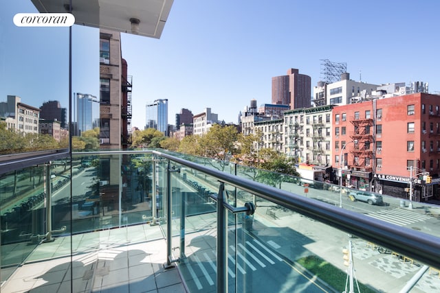 balcony featuring a city view