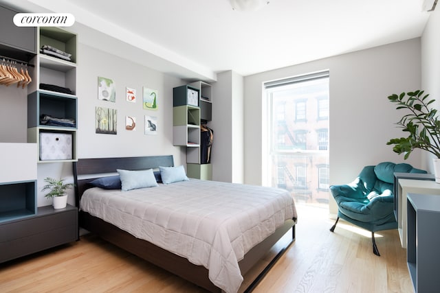 bedroom featuring light wood-type flooring