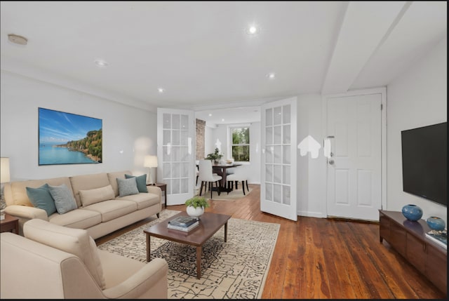 living room featuring dark wood-type flooring and french doors