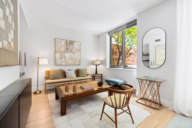 bedroom with light hardwood / wood-style floors