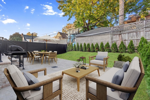 view of patio featuring an outdoor living space, a grill, a fenced backyard, and outdoor dining space