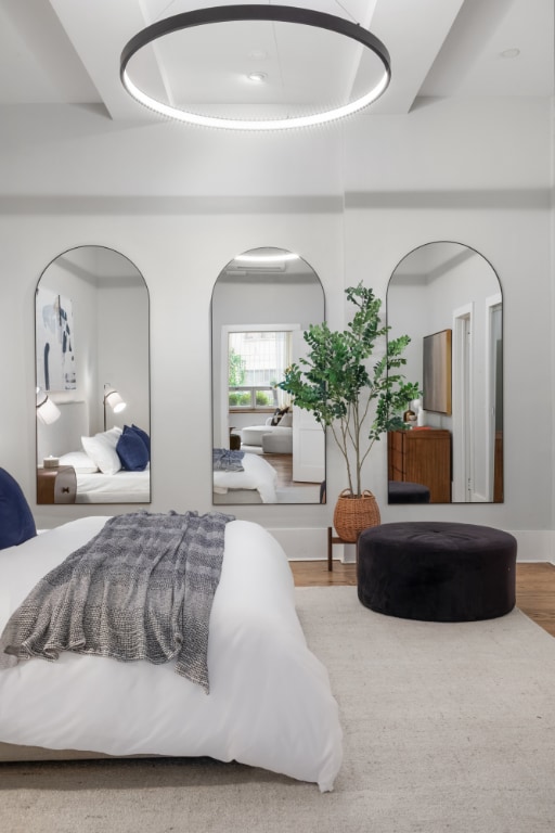 bedroom with light hardwood / wood-style floors