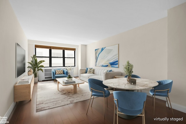 living room with dark hardwood / wood-style flooring