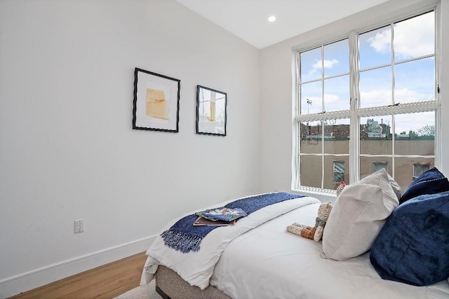 bedroom featuring wood-type flooring