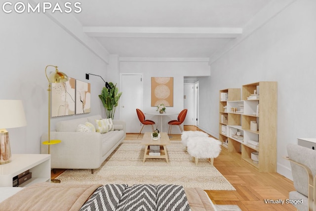 sitting room with beam ceiling and parquet flooring