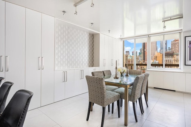 dining area with light tile patterned floors