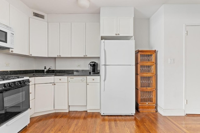 kitchen featuring white cabinetry, white appliances, sink, and light hardwood / wood-style flooring