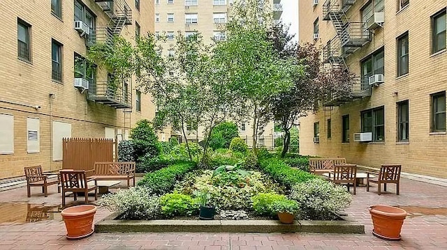 surrounding community with a patio area